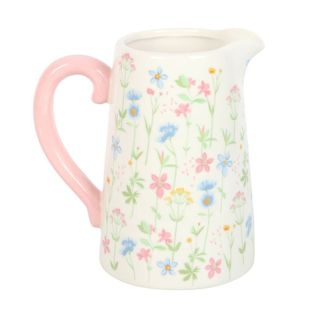 Charming ceramic flower jug with pale pink handle and floral design, 1300ml. Perfect vase or décor piece, handwash only, part of Floral Blooms Collection.