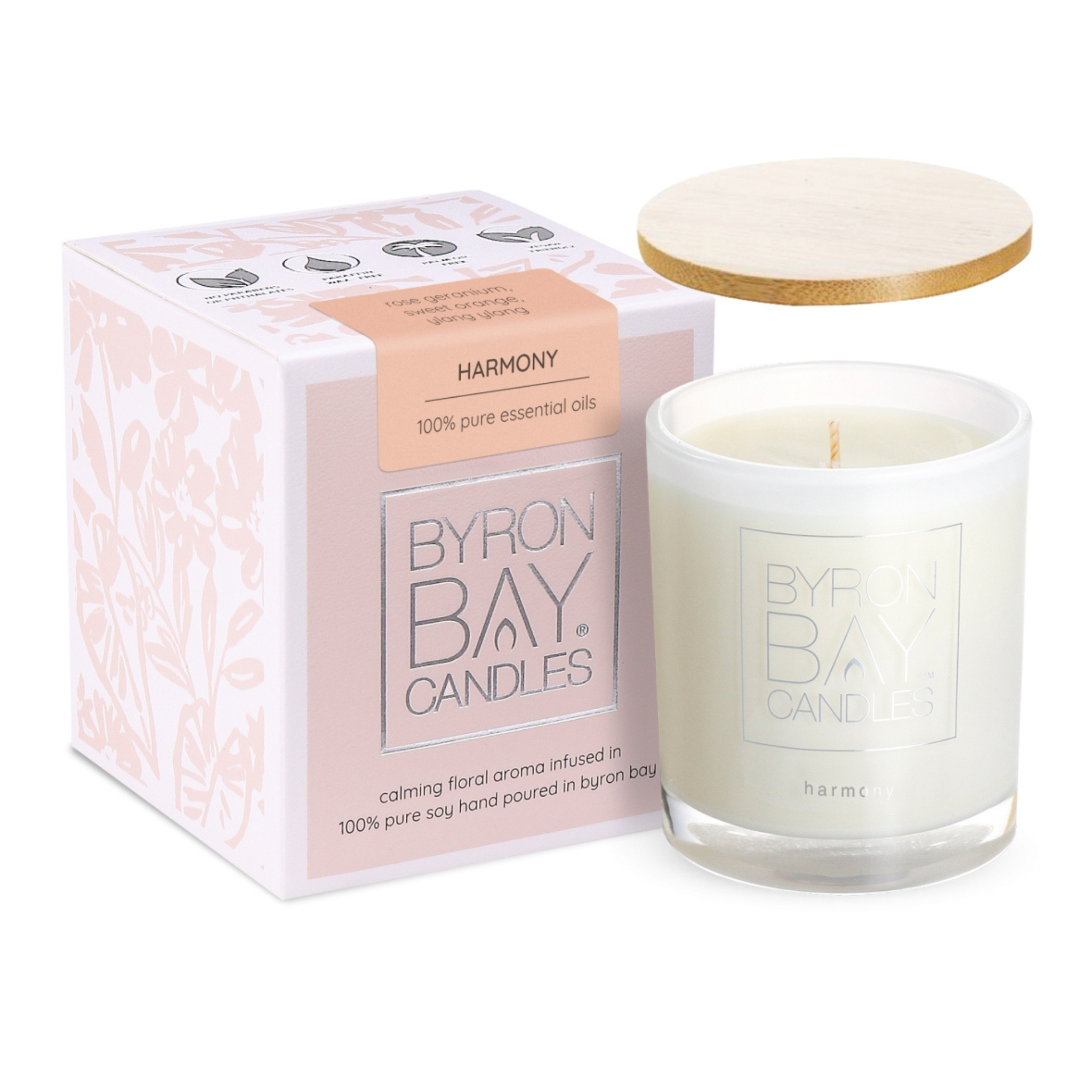 Harmony medium soy candle, 75x75x85mm jar in soft calming tones, hand-poured with 100% pure soy wax and cotton wick. Features sweet orange, ylang ylang, and rose geranium scent with 30+ hours burn time, natural timber lid, and gift box.