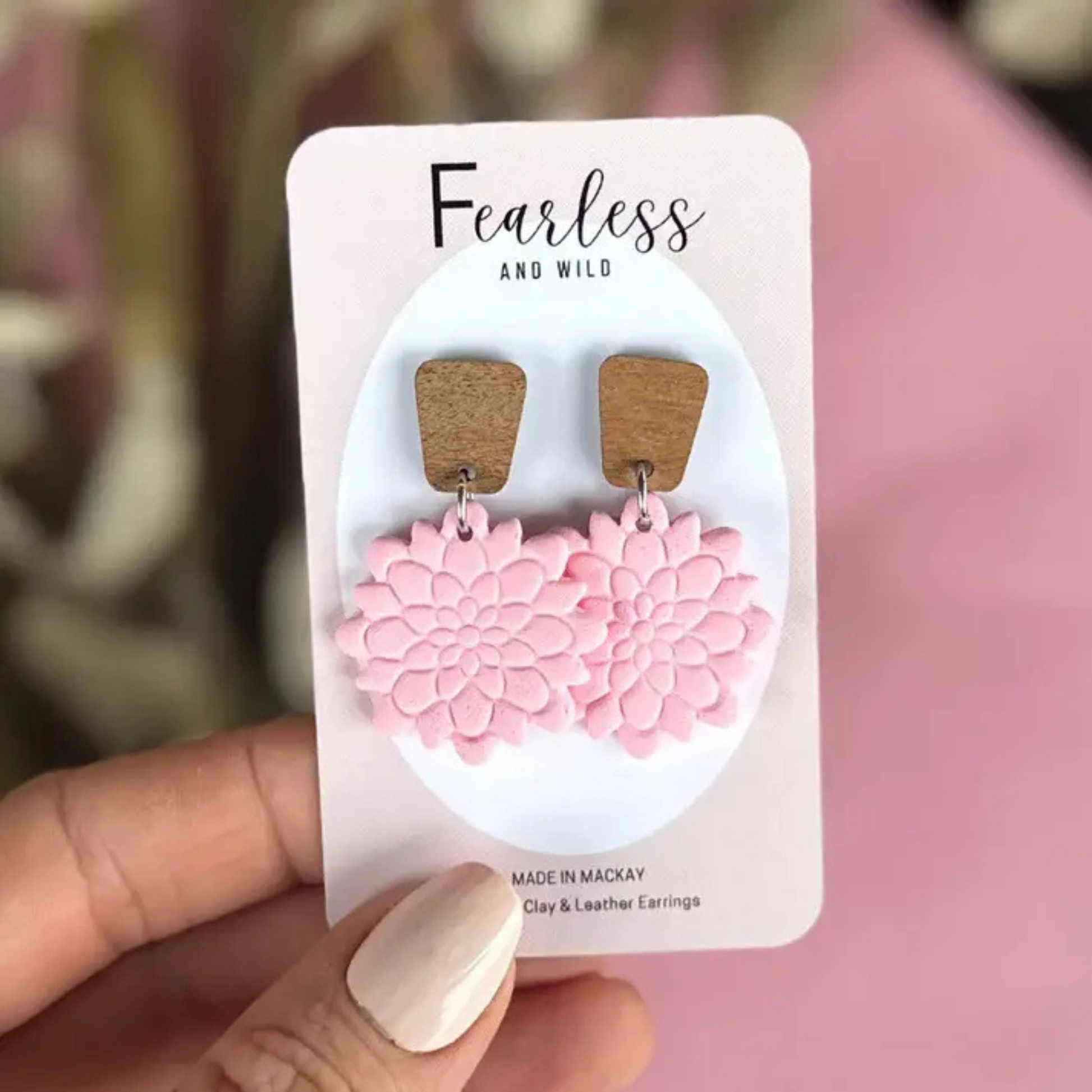 Handmade Fifi Soft Pink dangle earrings with a stud top, featuring a delicate soft pink polymer clay design for a subtle and feminine spring accessory.