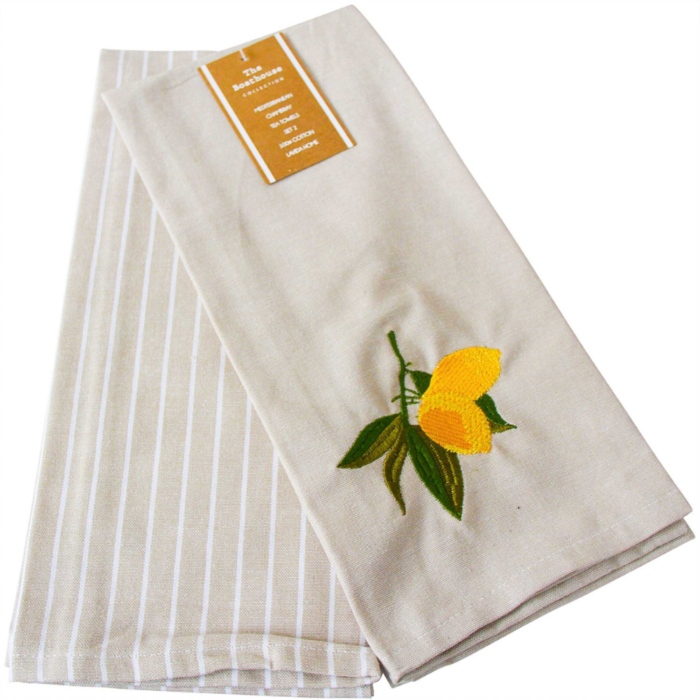 Set of folded towels with a lemon design and striped pattern