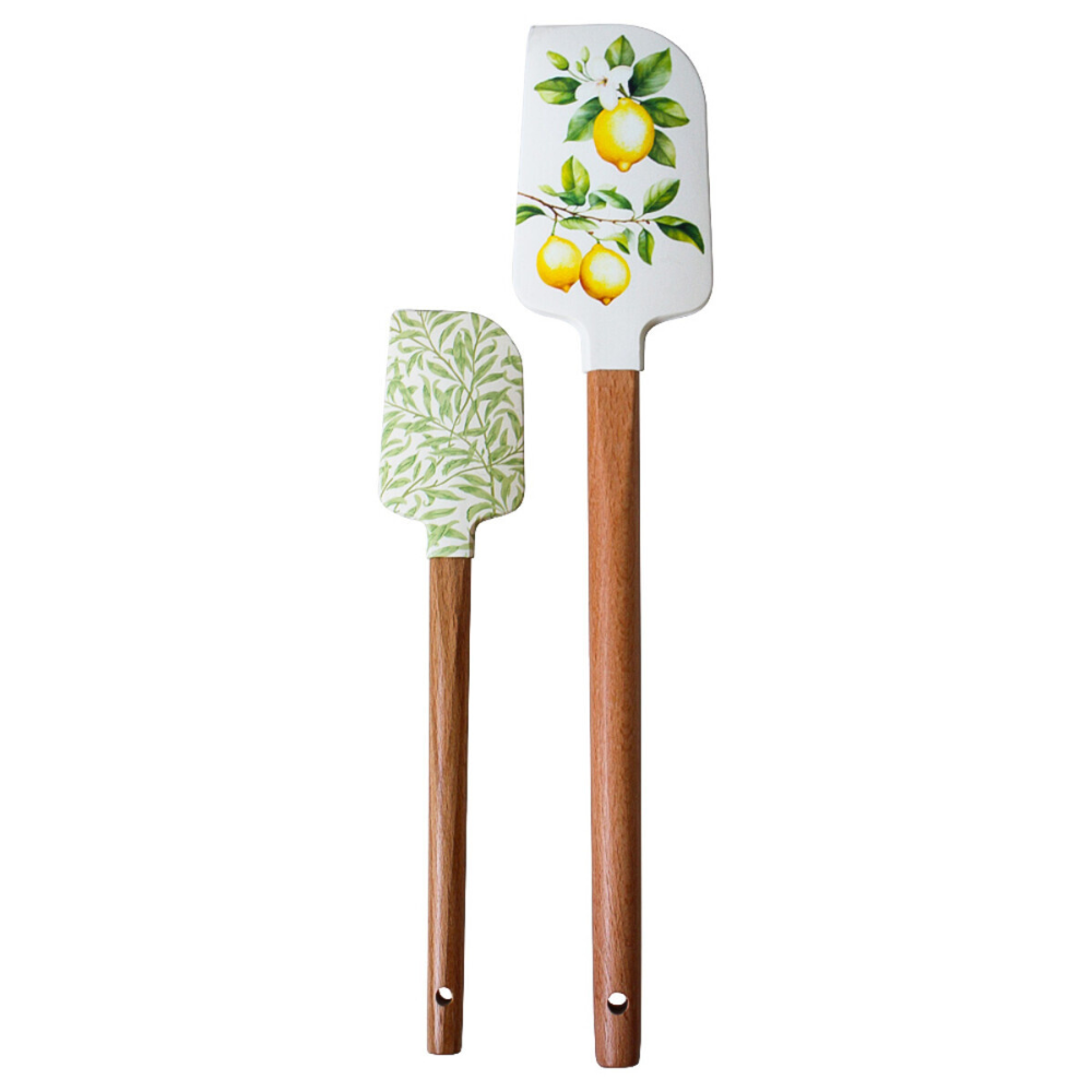Two spatulas with lemon decorative handles