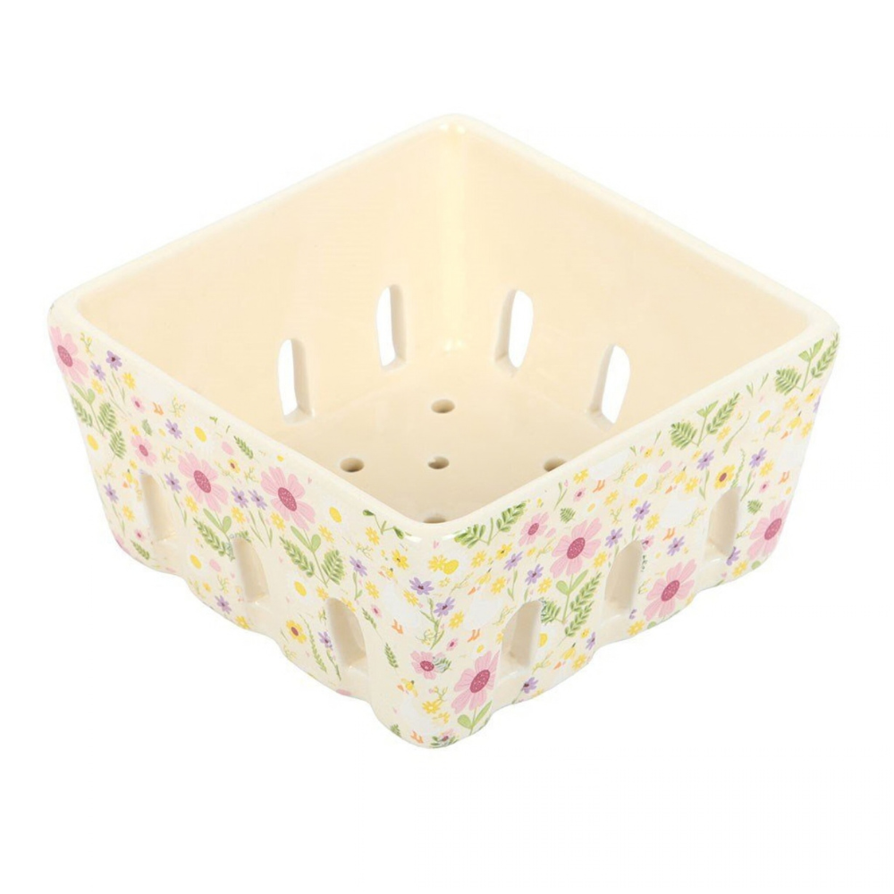 Square ceramic berry basket with floral pattern on a white background