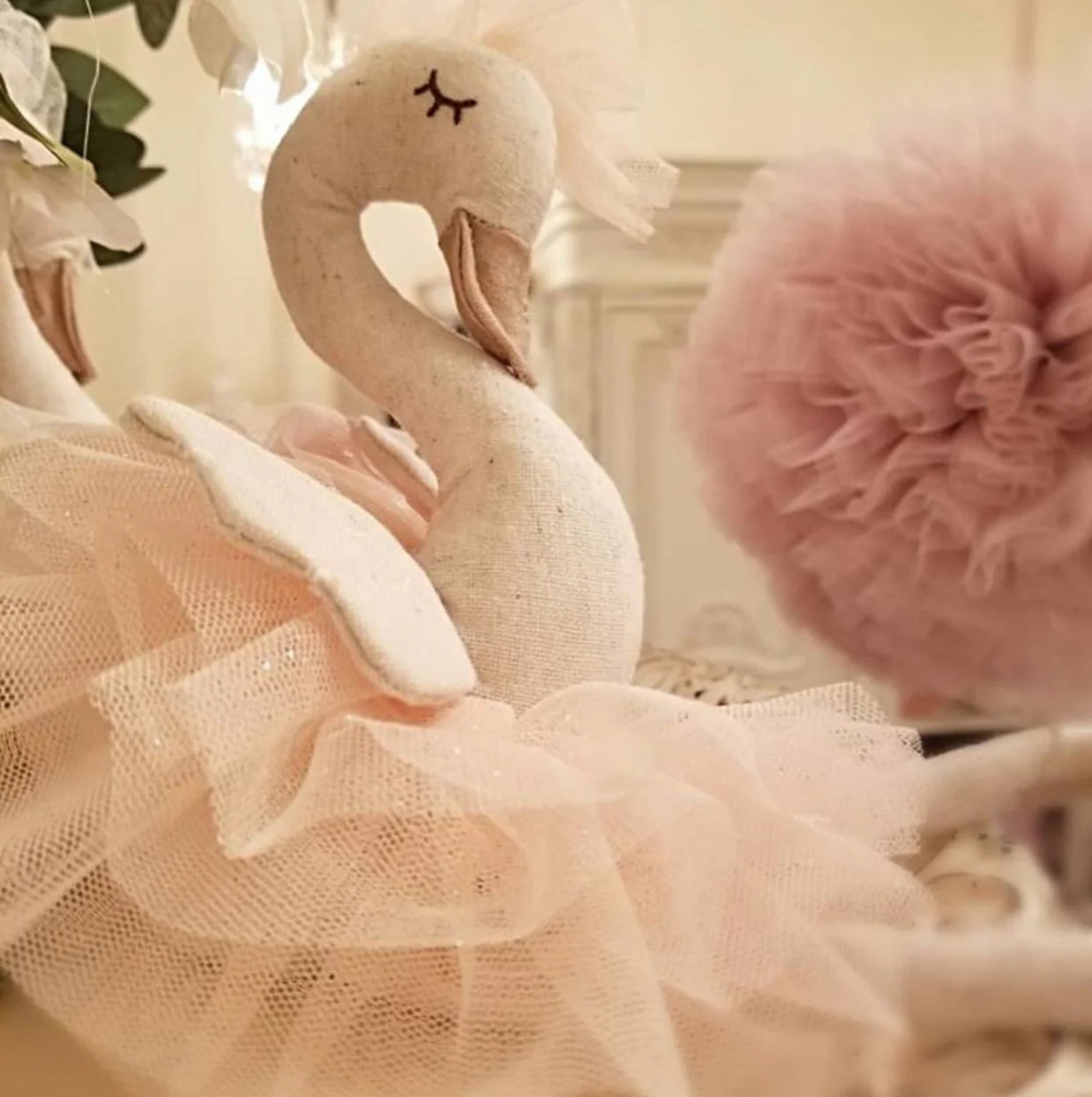 Odessa the Swan decorative figure, 28cm tall, made from linen with a soft tulle ballerina skirt, tulle bow, embroidered face, and gold ballet points.